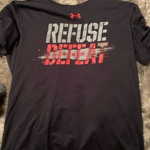 “Refuse Defeat” black Under Amour shirt.